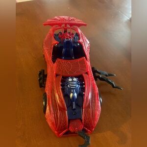 Red and Blue Webbed Adventure Toy Car